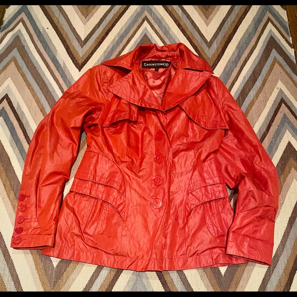 Colorful rain jacket with back belt details